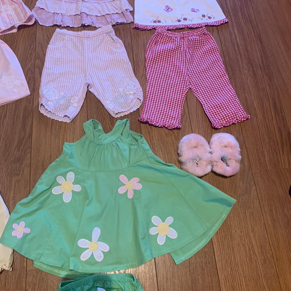 All items excellent condition, really beautiful and hardly worn. Monsoon 6-12 mth outfit (pic 2) Next 6-9 dress with matching shorts and dress with matching pants, Mothercare top with matching trousers, Next 6-9 dungarees, 6-9 green dress, sleep suit, long sleeve top, trousers, hat and Disney store Minnie Mouse slippers. From Smoke and pet free home.