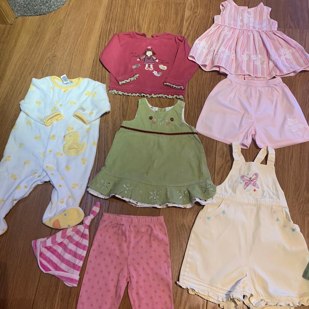 All items excellent condition, really beautiful and hardly worn. Monsoon 6-12 mth outfit (pic 2) Next 6-9 dress with matching shorts and dress with matching pants, Mothercare top with matching trousers, Next 6-9 dungarees, 6-9 green dress, sleep suit, long sleeve top, trousers, hat and Disney store Minnie Mouse slippers. From Smoke and pet free home.