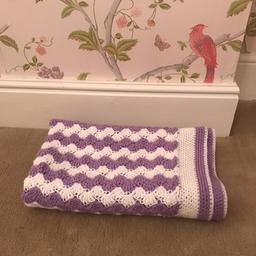Purple and white hand knitted blanket never used (brand new) most likely used as baby blanked can be picked up