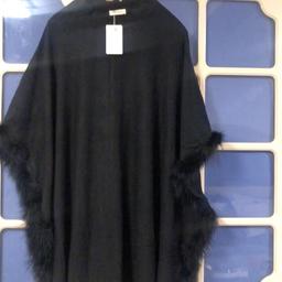 Brand new black black fur poncho. one Size.