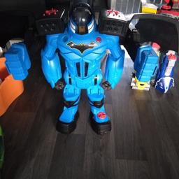 this cost £100 it is a fighting batman with handle on the back to fight with hours of fun for a little one