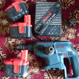 BOSCH 24 VOLT SDS HAMMER DRILL WITH. BATTERY CHARGER. AND 3 HEAVY DUTY BATTERIES 1 SPARE DETATCHABLE CHUCK