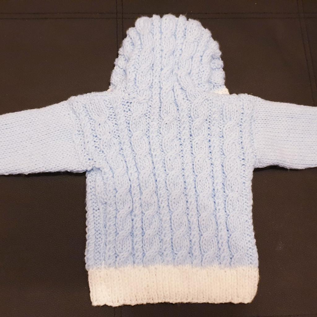 Hand Knitted in James Brett Baby DK Blue
 RIDGE CABLE STITCH ORDER ONLY
Deposit £5 time of Order non Refundable
Order your Colour for Girl OR Boy Blue
Lemon ,White,Pink,Mint,Peach,Lilac,Yellow,Silver Grey Only.Choose Contrast Colour
Crew Neck Cardigan
 Chest 20:
Length 10"
Sleeve 7"
Price for 1 only Postage will be £3.05 Check out my other Hand knitted items on sale.