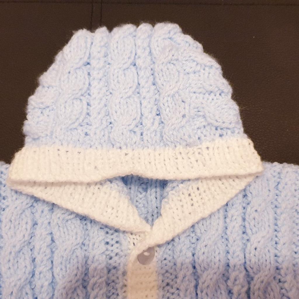 Hand Knitted in James Brett Baby DK Blue
 RIDGE CABLE STITCH ORDER ONLY
Deposit £5 time of Order non Refundable
Order your Colour for Girl OR Boy Blue
Lemon ,White,Pink,Mint,Peach,Lilac,Yellow,Silver Grey Only.Choose Contrast Colour
Crew Neck Cardigan
 Chest 20:
Length 10"
Sleeve 7"
Price for 1 only Postage will be £3.05 Check out my other Hand knitted items on sale.