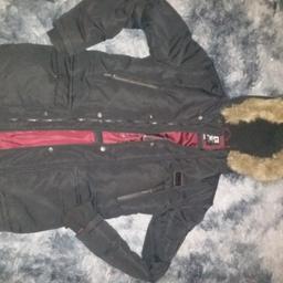 Stylish thick winter jacket/ fur around hood/ zips and buttons/ 6 pockets/ size 12/13 years only been worn on a occasions.

please check out my other items and follow me for great deals on new and used items