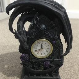 Dragon gothic clock. Battery powered. Heavy so ideally collection however will post if postage is covered. Birthday gift that I don't like or want. Used but not damaged. Like new.