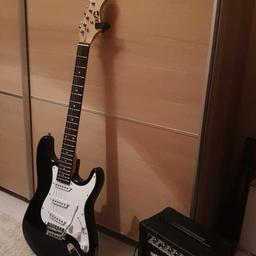 electric giutar Rock Jam with accessories used only few times. Like new.