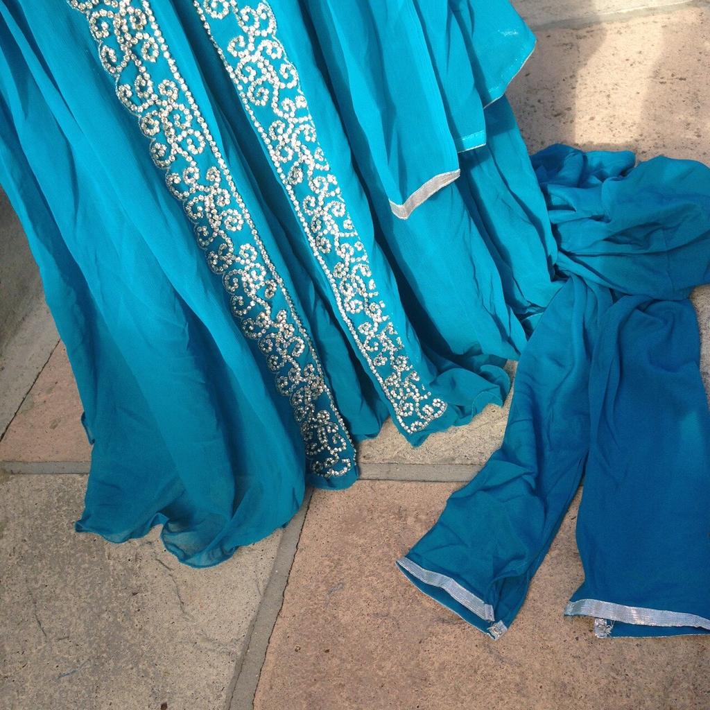 Blue maxi Asian Pakistani/ Indian dress. Fits size 8-12. Plain back comes with scarf and skinny trousers. Perfect for wedding or any Asian event. Brand new. Brought for £70.