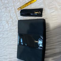 Brand new YSL make up bag with free OPIUM perfume spray bottle with cover protector.