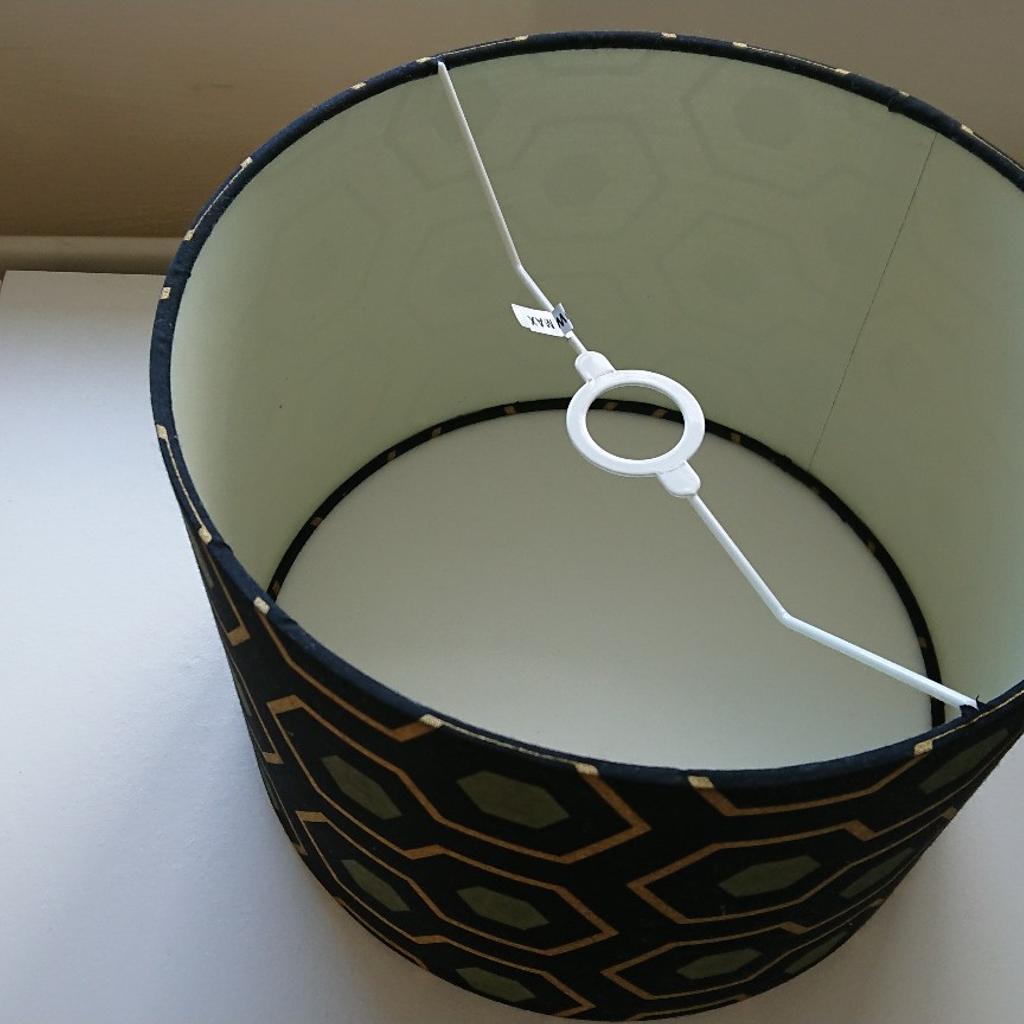 Olive green, gold and black Geo print lampshade, looks great from the ceiling or on a lamp.
