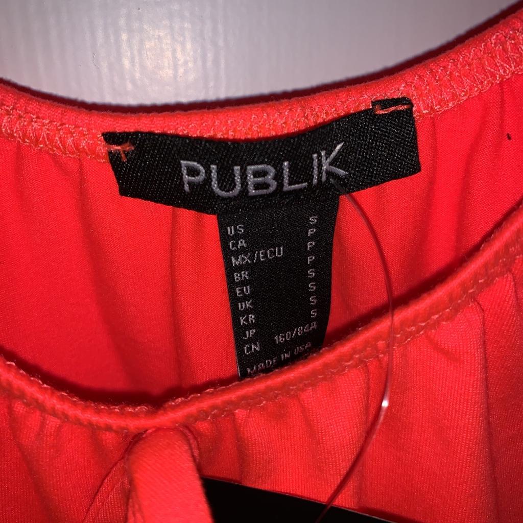 Brand new Publik women’s crop top. Size small. Tags still on. Postage not included if required.