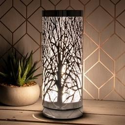 Comes with three bags of wax melts 
Aroma Lamp With Silver/White Silouhhette Design
Also Acts As An Oil Warmer With A Small Glass Pot That Is Included.
Touch Sensitive Turn On And Off By Simply Touching The Lamp.
UK Mains Powered
Suitable for Oils and Wax Melts