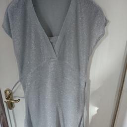 New Look Inspire 18 sleeveless jumper, silver glitter, ties at back round waist area, vneck.
Collection WF2
P & P Royal Mail.