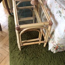 Cane nest of two tables with glass tops.
Larger table size 19 ins x 14 ins x 19 ins high, and smaller table fits under.
For collection.