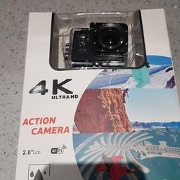 brand new action camera...never used as unwanted present.  all accessories included.