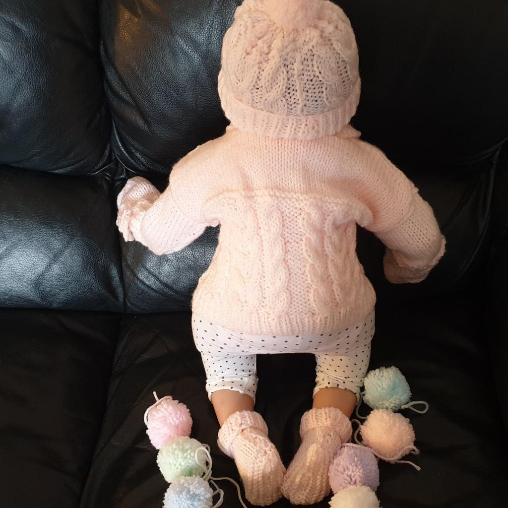 SET AT £12.50 Cable Jacket with
with 2 satin motifs
Booties & Mittens pom pom hat Avaliable at £6
Cardigan £7

 MEASUREMENTS
CHEST 18"
 Length 10"
Sleeve 5.5"
Boy or Girl
Can order colours blue,aqua,silver grey, white,pink,lilac,peach,mint lemon,Deep Lemon

100% ACRYLIC MACHINE WASH 40%.
THIS ITEM IS HAND KNITTED BY MYSELF
COMES FROM A SMOKE AND PET FREE HOME.

OPEN FOR CUSTOM BABY ORDERS MAY BE A WAITING LIST DEPENDING ON MY ÒRDERS AT THE TIME OF ORDER
SO ORDER EARLY
POSTAGE WILL BE £3.20