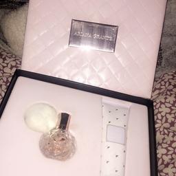 Ari gift set💞 got for Christmas years ago so the Purfume has been used but is half full, body lotion has never been touched, will takes offers xx
