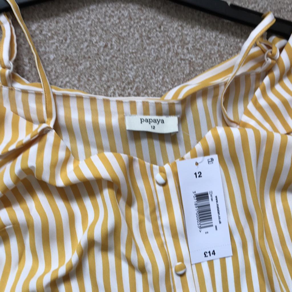 Brand new yellow striped cold shoulder top. Open to offers