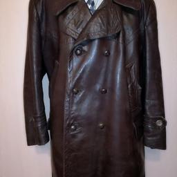 KRIEGSMARINE Post WW2 German Army Military Brown Horsehide Leather U-Boat Captains Jacket Trench Coat from 50's. Some call them Coachmen's coats.
Very rare halfbelted pea coat with scolloped chest pockets.
Exactly the same, but black was worn by Joseph Goebbels - Reich Minister in Nazi Germany.
An excellent opportunity to purchase an extremely rare overcoat, ideal for a private museum.
Size: XL / 56
Shoulders: 52 cm
Chest: 66 cm
Back length: 86 cm
Sleeves: 69 cm
Shipping with tracking.