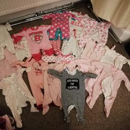 3-6 months baby vests and sleepsuits. all worn but in great condition