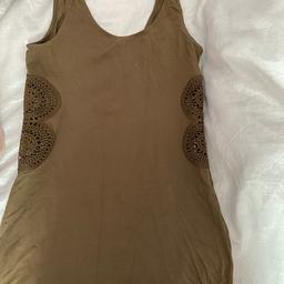 bodycon dress
size 10 but could fit a 12
lovely detail design on sides of the dress
never worn