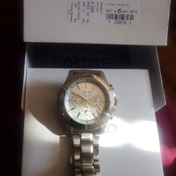 lovely chrome, satin chrome with gold detail watch. bought from debenhams £260 paid. worn twice. will sell for a third of retail so no offers.