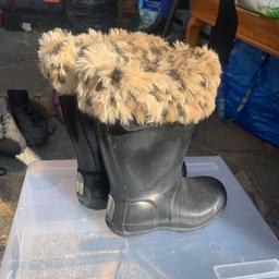 Hunter wellies and socks in small size 10 boots are black and leopard print socks
