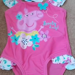 New - Peppa Pig swimsuit. Age 9-12 months. Tags still attached. 