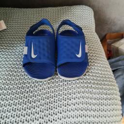 infant size 4.5 kids blue Nike sandles.. used last year on holiday (only worn twice maybe three times) like new just didn't take sticker off inside. collect bl2