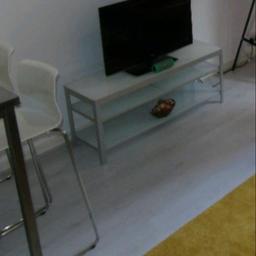 Stand tv with glass from Ikea white color. Dimensions are 40x50x120. . Pick up near Bounds Green