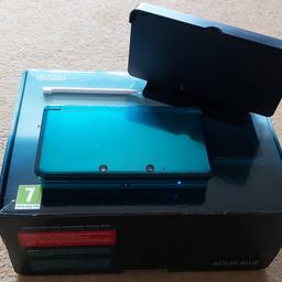 3DS console in turquoise, in excellent condition. I can't find the charger for it and a stylus pen is missing.
