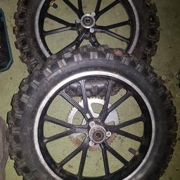 mini dirtbike wheels with tyres and sprocket good condition 

postage available