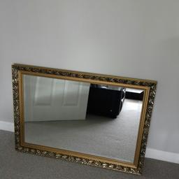 Brass edged mirror good condition
