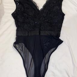 Brand new , Brought but didn’t fit , women’s black lace bodysuit from new look , perfect condition , women’s size 12, smoke free home, open to offers x RRP £27.99 when I brought it x