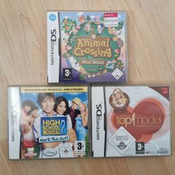 Animal Crossing Wild World und als Beigabe noch 2 andere Spiele.