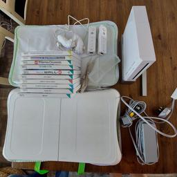 Console , 2 controllers with nunchucks, 11 games, wii fit board, excellent condition. Wii fit board battery cover is missing, but this does not affect operating.