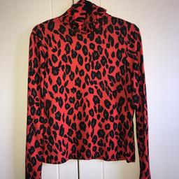 Women’s red leopard print turtleneck.
Had it’s worn, lovely and comfy.
Primark, size 12/14 (M)