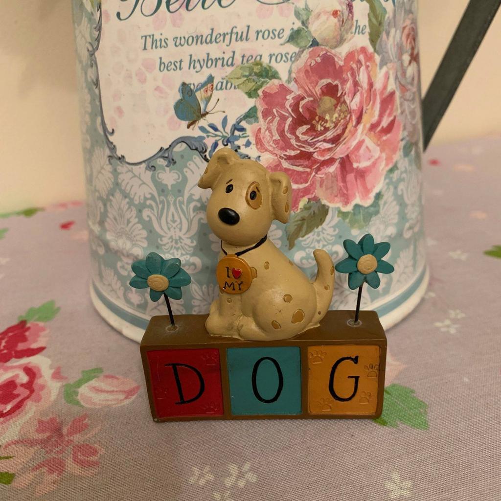 Dog and Flower Decoration £4 + £3.50 postage (or collection from Mansfield, NG19).

Size: 9 cm