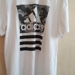 XL Adidas white T-shirt with black and grey  print. Tag removed, but T-shirt has only been  tried on not worn.