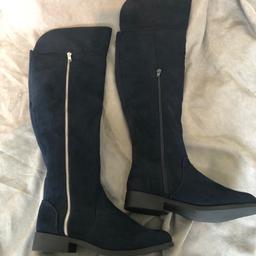 Navy Blue Faux Suede Stretch Knee High Boots With Zip Detail
Size UK 6
Comfort  Fit 
Elasticated back & side zips
Worn Once & In Great Condition
From A Smoke & Pet Free Home
Selling Multiple Items!
Happy To Post, Combine Postage & Accept PayPal
Best Wishes!