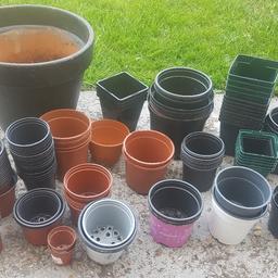 I have 122 plastic plant pots for sale.