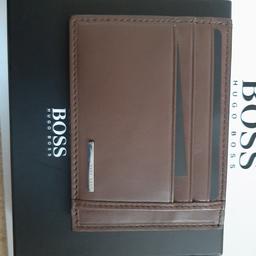 brand new in box with tags, with a hugo boss gift bag, unwanted gift