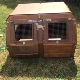 Dog travel box great condition can be used as one big cage or separated into 2 can also be used as chicken/rabbit/Guinnea pig house etc 
 Size L44” H27” W37”

Collapsible