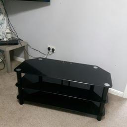 I had this TV stand in black.i  had the TV put on to the wall .and  been useing  it as a table but now my wife wants to get wood table .it's in very good condition very Cheap thank you for looking