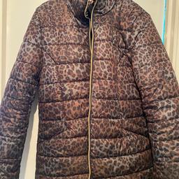size 10/12 but much closer to a 12
to big for me
lovely design and material
puffer jacket style