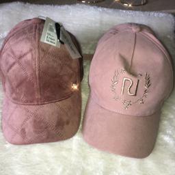 X 2 RI Caps 
1 brand new with tags 
1 no tag but brand new 
Aged 5-12 years 
£8 for both 
NO OFFERS