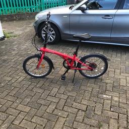 Hi for sale  vary good  btwen bicycle. 
   Used but vary new and clean 
 Running  with  no issues 
 I need to sale not longer need it 
 £120 
 Brand new was £299

Colour in red 
Frame

The Btwin Tilt 120 Folding Bicycle (2018) is a Folding Bicycle which has an Hi-Ten Steel Frame.
Gearing

The Btwin Tilt 120 Folding Bicycle has a 6-Speed rear derailleur and Grip Shifters.
Gearing

This folding bicycle from Btwin comes with V-Brakes.
Fork/Suspension

The Btwin Tilt 120 Folding Bicycle has a Hi-Ten