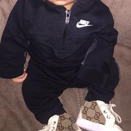 Nike tracksuit says 6 months but fits 0-3 better £15