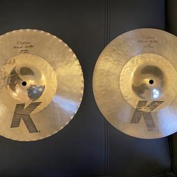 Selling it due to house move. It was £346 new! Now £400. 

The K Custom-Hybrid is the Holy Grail of Hit-Hats! You won't be disappointed. Check out the 5 star reviews online. TOP + BOTTOM, No bends. Please note, it has been cleaned and polished pre-sale.

Hybrid Hit-HaT CYMBAL
> Top and Bottom Hat
> Alloy: B20 Bronze
> Hand hammered: yes
> Finish: brilliant
> Size: 13.25" or 33cm
> Brilliant finish on the inner-facing parts of the cymbals
> Regular finish on the outside of the cymbals
