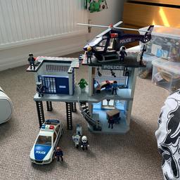 Police station comes with figures and extras including police car police bike and police helicopter good condition pick up only